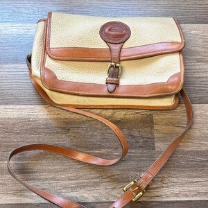 vintage Dooney & Bourke All-Weather Leather Surrey crossbody bag in cream/beige
